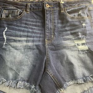 Dark blue jeans with rips